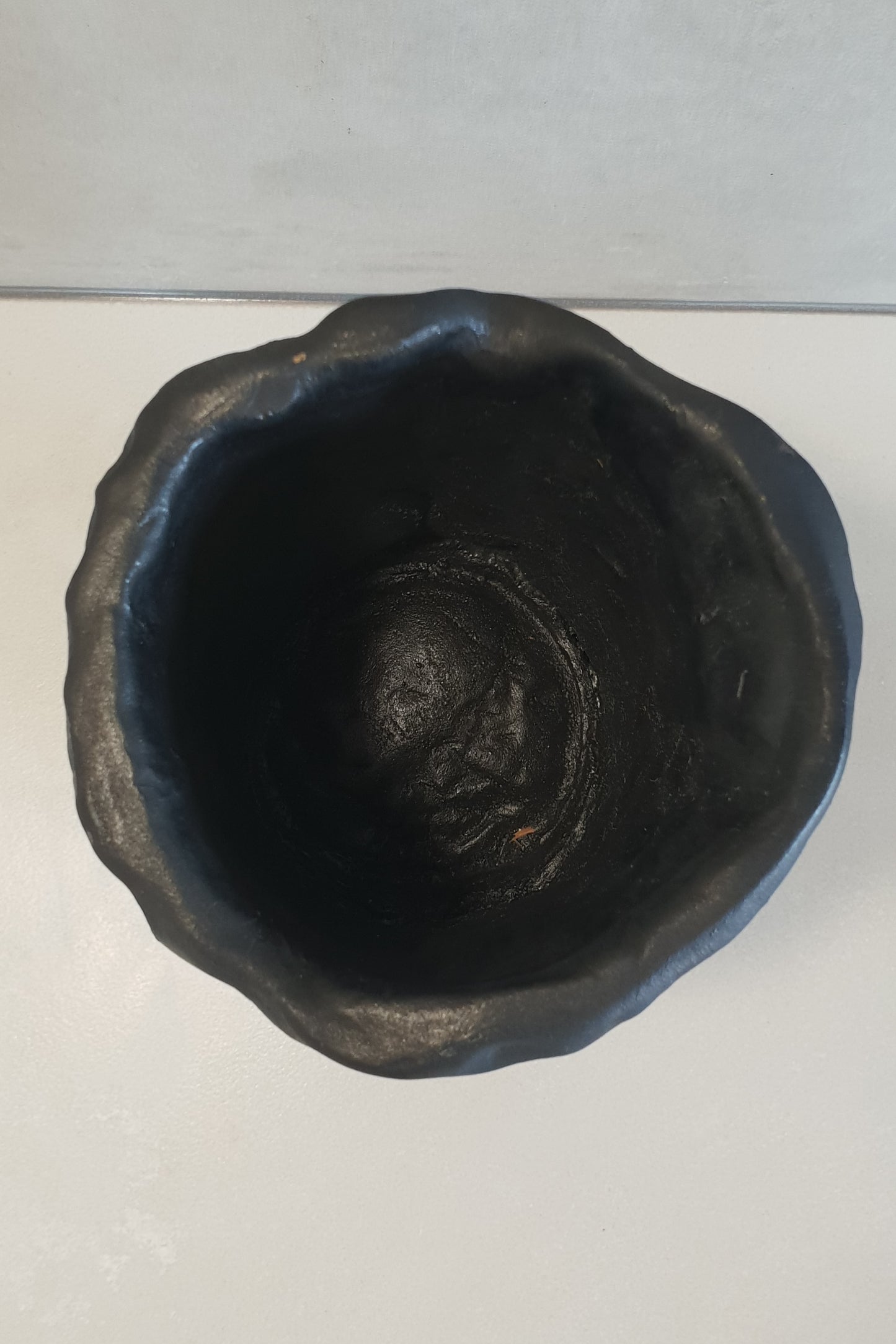 Matt black vase with stand